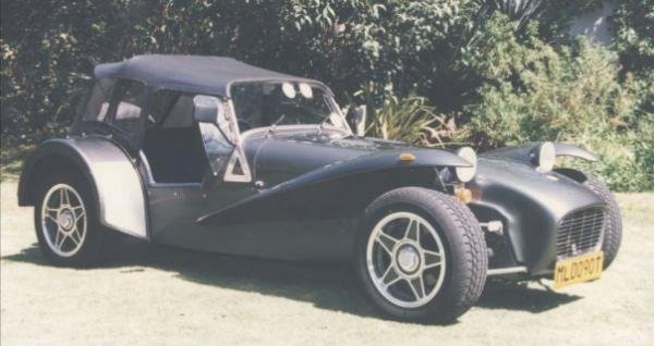 ...... Original car was polished aluminum with bright blue fenders and nose cone. Replaced wheels and tires with the nice wide Bridgstone RE71s and I can't remember the brand of wheels......