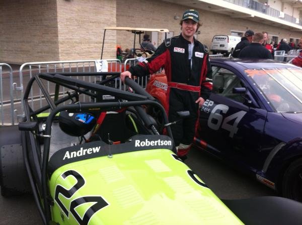 Andrew and car on grid