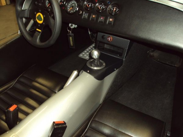 The tunnel cover and shift console was hand-fabricated by Tom over at Beauchamp Racing and Restoration